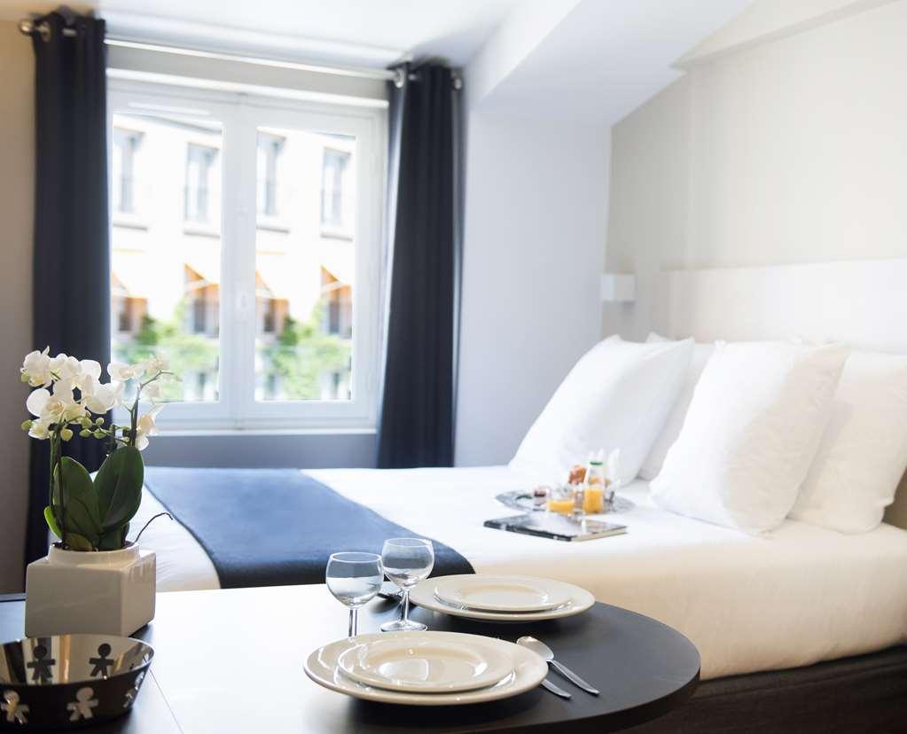 Suites & Hotel Helzear Montparnasse París Habitación foto